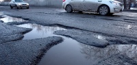 Эксперты нашли самую большую яму и самую разбитую дорогу в России 